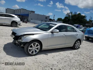 2014 Cadillac ATS Standard RWD with VIN 1G6AA5RA3E0175573, listed as a Copart auction lot 61925725 with 19,933 mi miles and Salvage title. Bid and sale history available at DreamBid. Image 1.