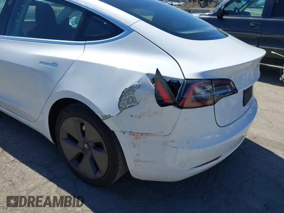 2019 Tesla Model 3 Mid Range with VIN 5YJ3E1EA1KF422983, listed as a IAAI auction lot 41861334 with 53,017 mi miles. Bid and sale history available at carsss.com. Image 6.