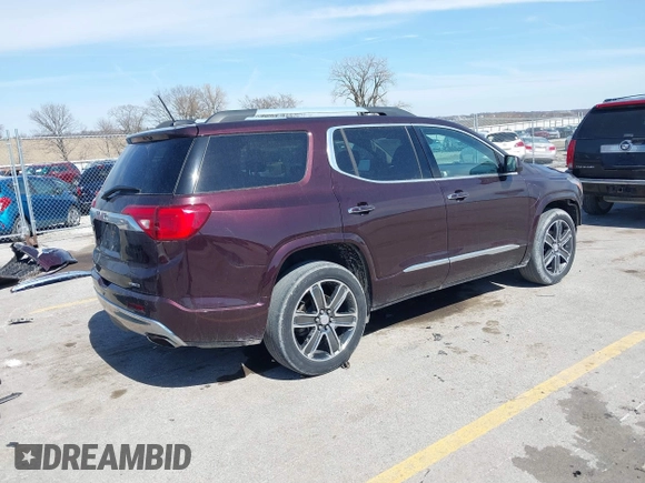 2017 GMC Acadia Denali with VIN 1GKKNXLS9HZ205098, listed as a IAAI auction lot 41884746 with 91,009 mi miles and . Bid and sale history available at carsss.com. Image 4.
