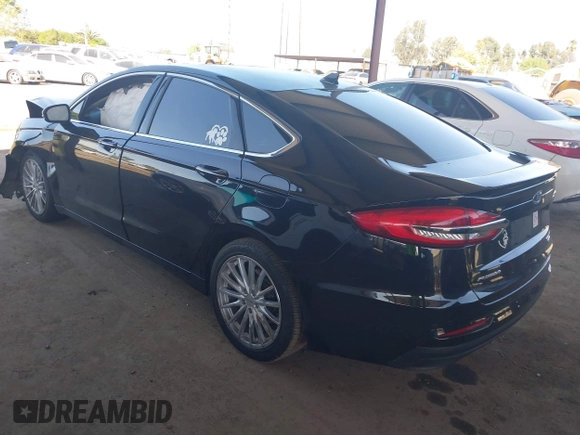 2020 Ford Fusion Titanium with VIN 3FA6P0RU8LR141324, listed as a IAAI auction lot 42004026 with 107,136 mi miles and . Bid and sale history available at DreamBid. Image 3.