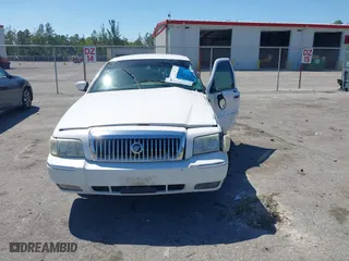 2007 Mercury Grand Marquis LS with VIN 2MEFM75VX7X623356, listed as a IAAI auction lot 41783361 with 157,921 mi miles. Bid and sale history available at carsss.com. Image 13.