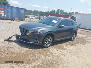 2018 Mazda CX-9 Grand Touring with VIN JM3TCADY7J0217595, listed as a IAAI auction lot 42381331 with 130,604 mi miles and . Bid and sale history available at DreamBid. Image 20.