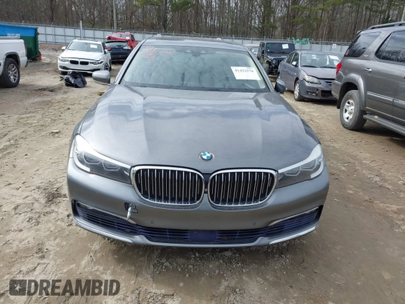 2017 BMW 7 Series 740i with VIN WBA7E2C54HG740170, listed as a IAAI auction lot 41432578 with 110,893 mi miles and . Bid and sale history available at DreamBid. Image 6.