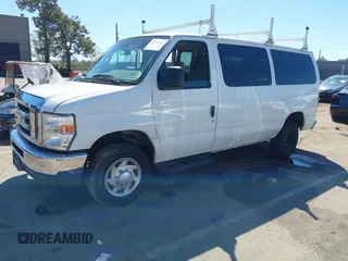 2014 Ford Econoline Passenger XL with VIN 1FBNE3BL7EDA37146, listed as a IAAI auction lot 41871526 with 139,387 mi miles. Bid and sale history available at carsss.com. Image 2.