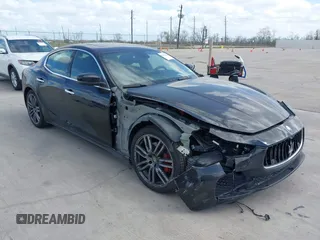 2017 Maserati Ghibli with VIN ZAM57XSA6H1218753, listed as a IAAI auction lot 41833235 with 42,135 mi miles. Bid and sale history available at carsss.com. Image 1.