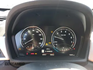 2021 BMW X1 sDrive28i z VIN WBXJG7C06M5U15436, wystawiony jako Copart lot #52382635 z przebiegiem 57 917 mil mil oraz Szkody całkowita. Historia ofert i sprzedaży dostępna na DreamBid. Obrazek 9.