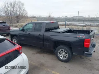 2014 Chevrolet Silverado 1500 LT with VIN 1GCVKREC8EZ325070, listed as a IAAI auction lot 41328199 with 164,009 mi miles and . Bid and sale history available at DreamBid. Image 14.