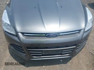 2014 Ford Escape SE with VIN 1FMCU9GX1EUE21729, listed as a IAAI auction lot 42475113 with 116,050 mi miles and . Bid and sale history available at DreamBid. Image 6.
