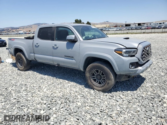 2020 Toyota Tacoma SR5 with VIN 3TMDZ5BN1LM087471, listed as a Copart auction lot 63074925 with 28,489 mi miles and Salvage title. Bid and sale history available at DreamBid. Image 4.