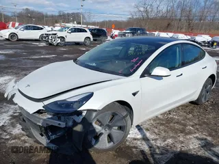 2023 Tesla Model 3 Long Range with VIN 5YJ3E1EBXPF392818, listed as a IAAI auction lot 41346835 with 31,750 mi miles and . Bid and sale history available at DreamBid. Image 21.