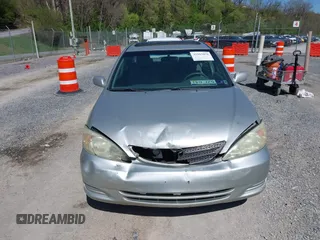 2004 Toyota Camry LE with VIN 4T1BE30K14U290983, listed as a IAAI auction lot 41983078 with 174,852 mi miles and . Bid and sale history available at carsss.com. Image 12.