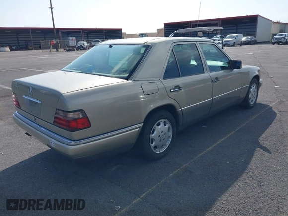 1995 Mercedes-Benz 400 E with VIN WDBEA34E8SC205155, listed as a IAAI auction lot 41399651 with 255,593 mi miles and . Bid and sale history available at carsss.com. Image 4.
