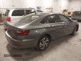2021 Volkswagen Jetta SEL with VIN 3VWE57BU9MM086571, listed as a IAAI auction lot 41322665 with 33,584 mi miles and . Bid and sale history available at DreamBid. Image 4.