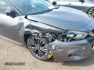 2016 Nissan Maxima SL z VIN 1N4AA6AP8GC417817, wystawiony jako IAAI lot #41772451 z przebiegiem 78 880 mil mil oraz . Historia ofert i sprzedaży dostępna na DreamBid. Obrazek 6.