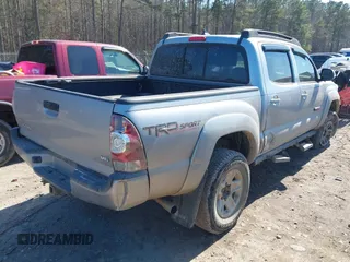 2015 Toyota Tacoma with VIN 5TFLU4EN7FX118530, listed as a IAAI auction lot 41638608 with 116,143 mi miles and . Bid and sale history available at DreamBid. Image 4.