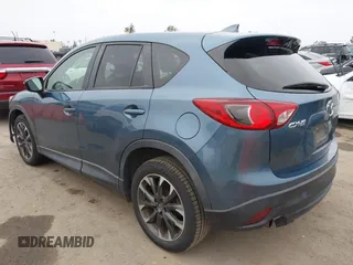 2016 Mazda CX-5 Grand Touring with VIN JM3KE2DY7G0875678, listed as a IAAI auction lot 42104888 with 30,566 mi miles. Bid and sale history available at carsss.com. Image 3.