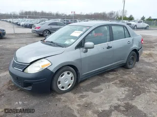 2009 Nissan Versa 1.8 S with VIN 3N1BC11E29L363158, listed as a IAAI auction lot 42070151 with 168,349 mi miles. Bid and sale history available at carsss.com. Image 2.