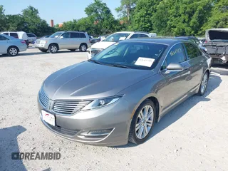 2016 Lincoln MKZ z VIN 3LN6L2G96GR601677, wystawiony jako IAAI lot #42647759 z przebiegiem 87 283 mil mil oraz . Historia ofert i sprzedaży dostępna na DreamBid. Obrazek 2.