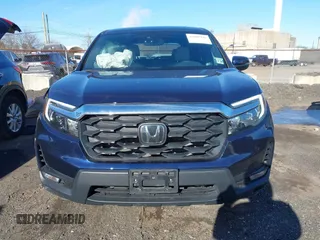 2023 Honda Passport EX-L with VIN 5FNYF8H51PB028045, listed as a IAAI auction lot 41609342 with 52,920 mi miles and . Bid and sale history available at DreamBid. Image 13.