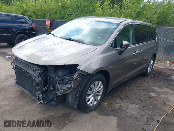 2017 Chrysler Pacifica Touring z VIN 2C4RC1DG2HR833473, wystawiony jako IAAI lot #42597208 z przebiegiem 78 239 mil mil oraz . Historia ofert i sprzedaży dostępna na DreamBid. Obrazek 21.