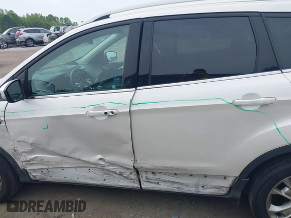 2016 Ford Escape Titanium with VIN 1FMCU9JX6GUB50226, listed as a IAAI auction lot 42033033 with 108,782 mi miles and . Bid and sale history available at DreamBid. Image 14.