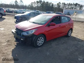 2014 Hyundai Accent GS with VIN KMHCT5AE7EU197806, listed as a IAAI auction lot 41458645 with 117,881 mi miles. Bid and sale history available at carsss.com. Image 2.
