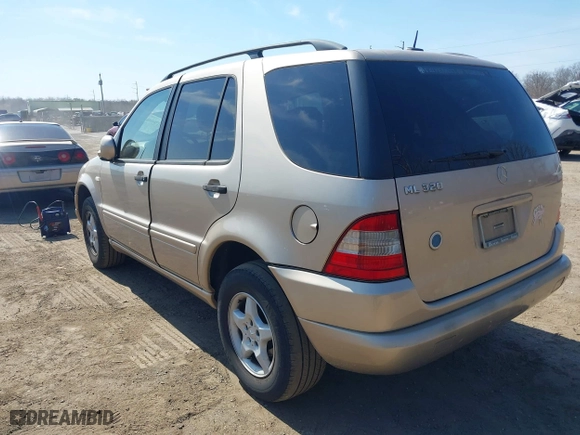 2001 Mercedes-Benz M-Class with VIN 4JGAB54E91A251754, listed as a IAAI auction lot 41784883 with 148,288 mi miles. Bid and sale history available at carsss.com. Image 3.