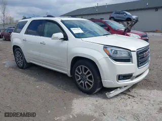 2014 GMC Acadia Denali with VIN 1GKKVTKD3EJ138763, listed as a IAAI auction lot 42011739 with 142,894 mi miles. Bid and sale history available at carsss.com. Image 1.