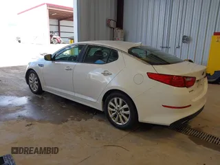 2015 Kia Optima LX with VIN KNAGM4A79F5616665, listed as a IAAI auction lot 42121526 with 153,022 mi miles. Bid and sale history available at carsss.com. Image 3.