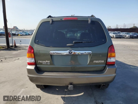 2002 Mazda Tribute LX with VIN 4F2YU08112KM16716, listed as a Copart auction lot 55095645 with 113,885 mi miles and Salvage Title. Bid and sale history available at DreamBid. Image 6.