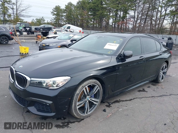 2019 BMW 7 Series 740i with VIN WBA7E2C57KB217973, listed as a IAAI auction lot 39064321 with 54,818 mi miles and . Bid and sale history available at DreamBid. Image 2.