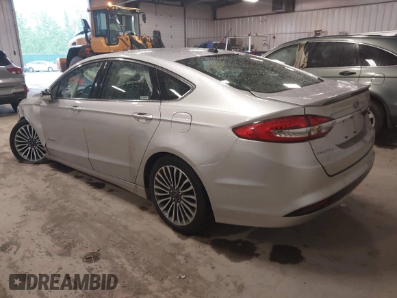 2018 Ford Fusion Titanium with VIN 3FA6P0RU9JR131818, listed as a IAAI auction lot 42442448 with 191,757 mi miles and . Bid and sale history available at DreamBid. Image 3.