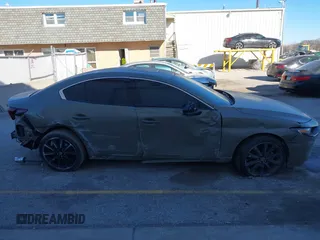 2024 Mazda 3 Carbon Edition with VIN 3MZBPBXY0RM404743, listed as a IAAI auction lot 41291652 with 18,231 mi miles and . Bid and sale history available at DreamBid. Image 14.