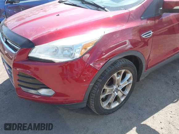 2013 Ford Escape SEL with VIN 1FMCU9H92DUD25669, listed as a IAAI auction lot 42070876 with 133,613 mi miles. Bid and sale history available at carsss.com. Image 6.