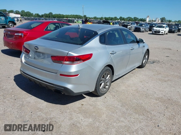 2019 Kia Optima LX with VIN 5XXGT4L3XKG294060, listed as a IAAI auction lot 42303397 with 127,081 mi miles and . Bid and sale history available at DreamBid. Image 4.