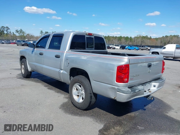 2008 Dodge Dakota SLT with VIN 1D7HE48K78S514290, listed as a IAAI auction lot 41766396 with 208,744 mi miles and . Bid and sale history available at carsss.com. Image 3.