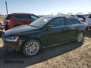 2012 Volkswagen Jetta TDI w/Premium & Nav z VIN 3VWLL7AJ2CM036128, wystawiony jako Copart lot #54503235 z przebiegiem 539 753 mil mil oraz Szkoda całkowita • Salvage title. Historia ofert i sprzedaży dostępna na DreamBid. Obrazek 1.