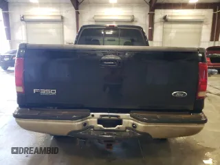 2002 Ford F-350 XL z VIN 1FTSW31F92EC17984, wystawiony jako Copart lot #55821575 z przebiegiem 346 645 mil mil oraz Szkoda całkowita • Salvage title. Historia ofert i sprzedaży dostępna na DreamBid. Obrazek 6.