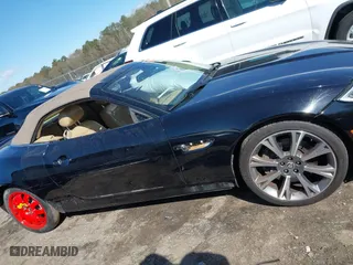 2014 Jaguar XK with VIN SAJWA4GB0ELB52358, listed as a IAAI auction lot 41832850 with 93,037 mi miles. Bid and sale history available at carsss.com. Image 14.