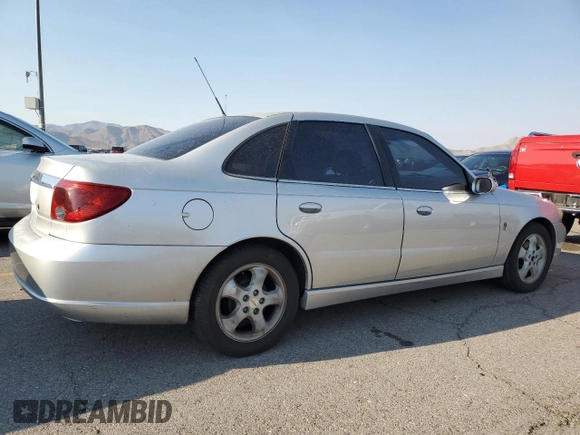2003 Saturn LS z VIN 1G8JU54F13Y552725, wystawiony jako Copart lot #50244805 z przebiegiem 131 259 mil mil oraz Szkoda całkowita • Salvage title. Historia ofert i sprzedaży dostępna na DreamBid. Obrazek 3.