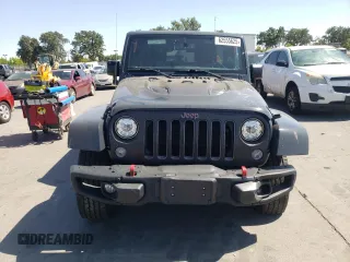 2018 Jeep Wrangler Unlimited Rubicon Recon с VIN 1C4BJWFG4JL806758, выставлен на аукционе Copart как лот 62555625 с пробегом 142 527 миль миль и Списание • Salvage title. История ставок и продаж доступна на DreamBid. Изображение 5.