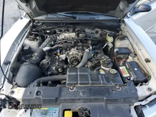 2000 Ford Mustang GT z VIN 1FAFP42X8YF309852, wystawiony jako Copart lot #57959605 z przebiegiem 251 001 mil mil oraz Szkoda całkowita • Salvage title. Historia ofert i sprzedaży dostępna na DreamBid. Obrazek 11.
