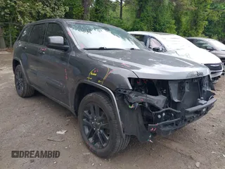 2018 Jeep Grand Cherokee Altitude with VIN 1C4RJEAG1JC344711, listed as a IAAI auction lot 42293825 with 99,946 mi miles and . Bid and sale history available at DreamBid. Image 1.