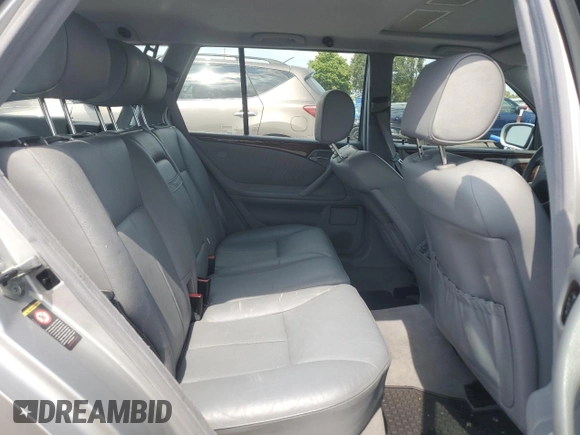 2001 Mercedes-Benz E-Class with VIN WDBJH65J41B201471, listed as a Copart auction lot 68863194 with 106,893 mi miles and Salvage Title. Bid and sale history available at carsss.com. Image 11.