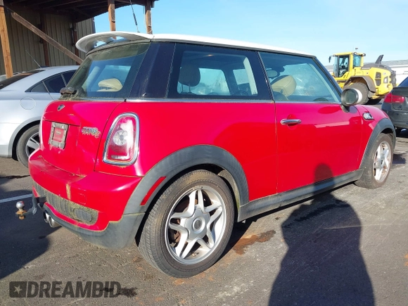 2010 MINI Hardtop S with VIN WMWMF7C50ATZ69911, listed as a IAAI auction lot 41393076 with 94,891 mi miles and . Bid and sale history available at DreamBid. Image 4.