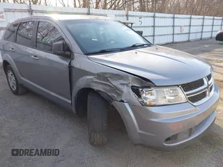 2015 Dodge Journey SE z VIN 3C4PDCAB7FT719679, wystawiony jako IAAI lot #41839838 z przebiegiem 119 610 mil mil oraz . Historia ofert i sprzedaży dostępna na DreamBid. Obrazek 1.