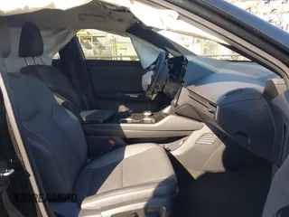 2024 Lexus RZ 300e Premium z VIN JTJABABB1RA004615, wystawiony jako IAAI lot #41310232 z przebiegiem 9 622 mil mil oraz . Historia ofert i sprzedaży dostępna na DreamBid. Obrazek 5.