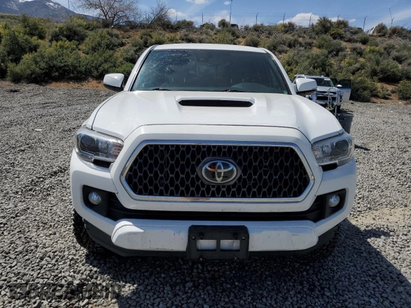 2019 Toyota Tacoma SR z VIN 3TMCZ5AN1KM263494, wystawiony jako Copart lot #54710695 z przebiegiem 57 216 mil mil oraz Szkoda całkowita • Salvage title. Historia ofert i sprzedaży dostępna na DreamBid. Obrazek 5.