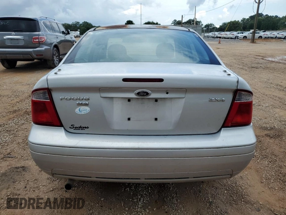 2006 Ford Focus S с VIN 1FAFP34N76W122783, выставлен на аукционе Copart как лот 60406325 с пробегом 290 434 миль миль и Списание • Salvage title. История ставок и продаж доступна на DreamBid. Изображение 6.