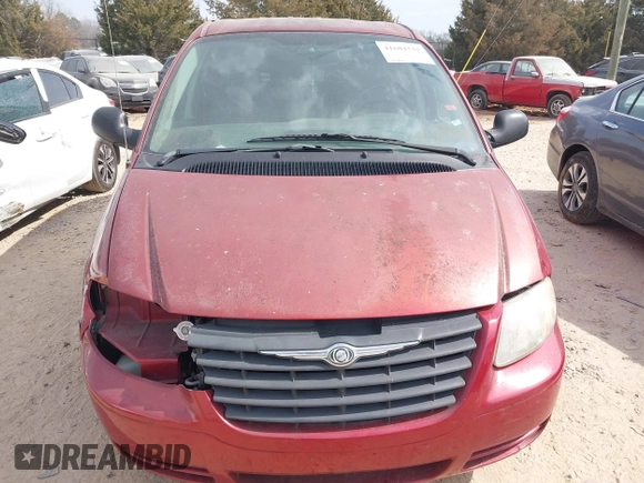 2007 Chrysler Town & Country SWB with VIN 1A4GJ45R57B120394, listed as a IAAI auction lot 41684731 with 219,802 mi miles. Bid and sale history available at carsss.com. Image 12.